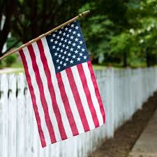 labor day flag and fence